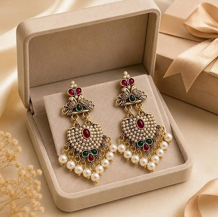  Pakistani wedding gift tray with traditional sweets, dry fruits, jewelry and elegant decorative packaging.
